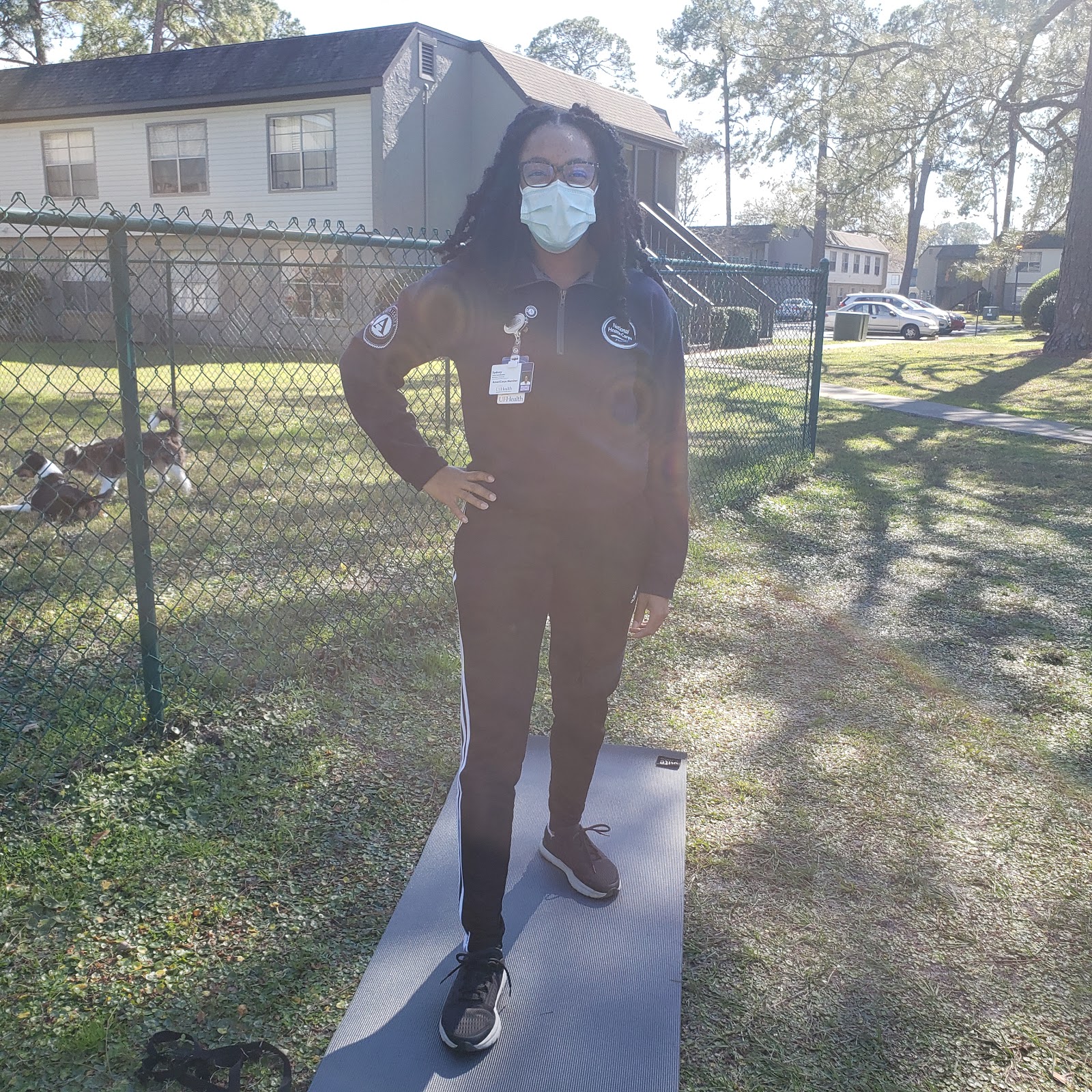 Sydney standing outside during a client one-on-one visit