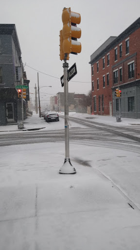 An intersection along one of the routes I take to my host site. Here, the sidewalks are frosted in snow and ice.